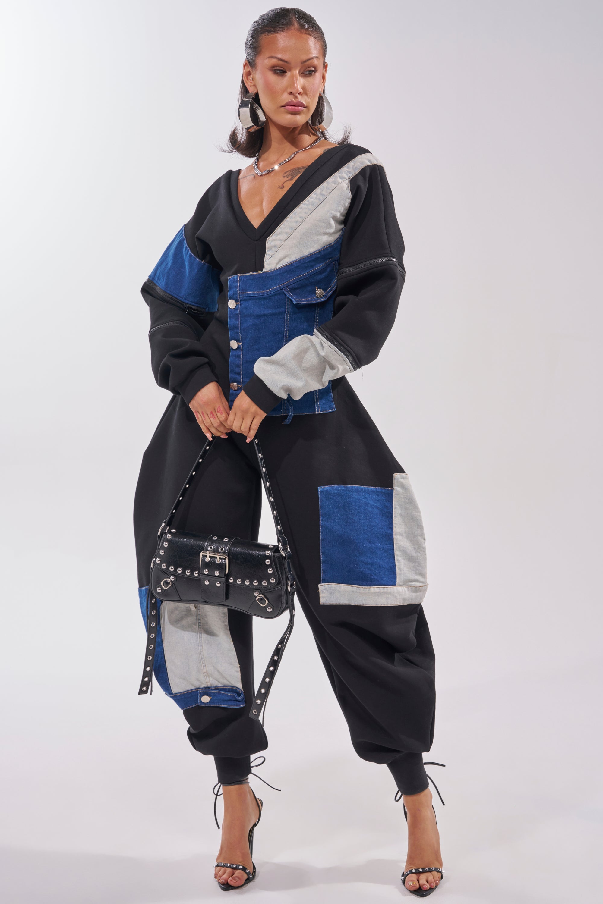 COMFY COZY SWEATSHIRT JUMPSUIT IN PATCHWORK DENIM IN BLACK