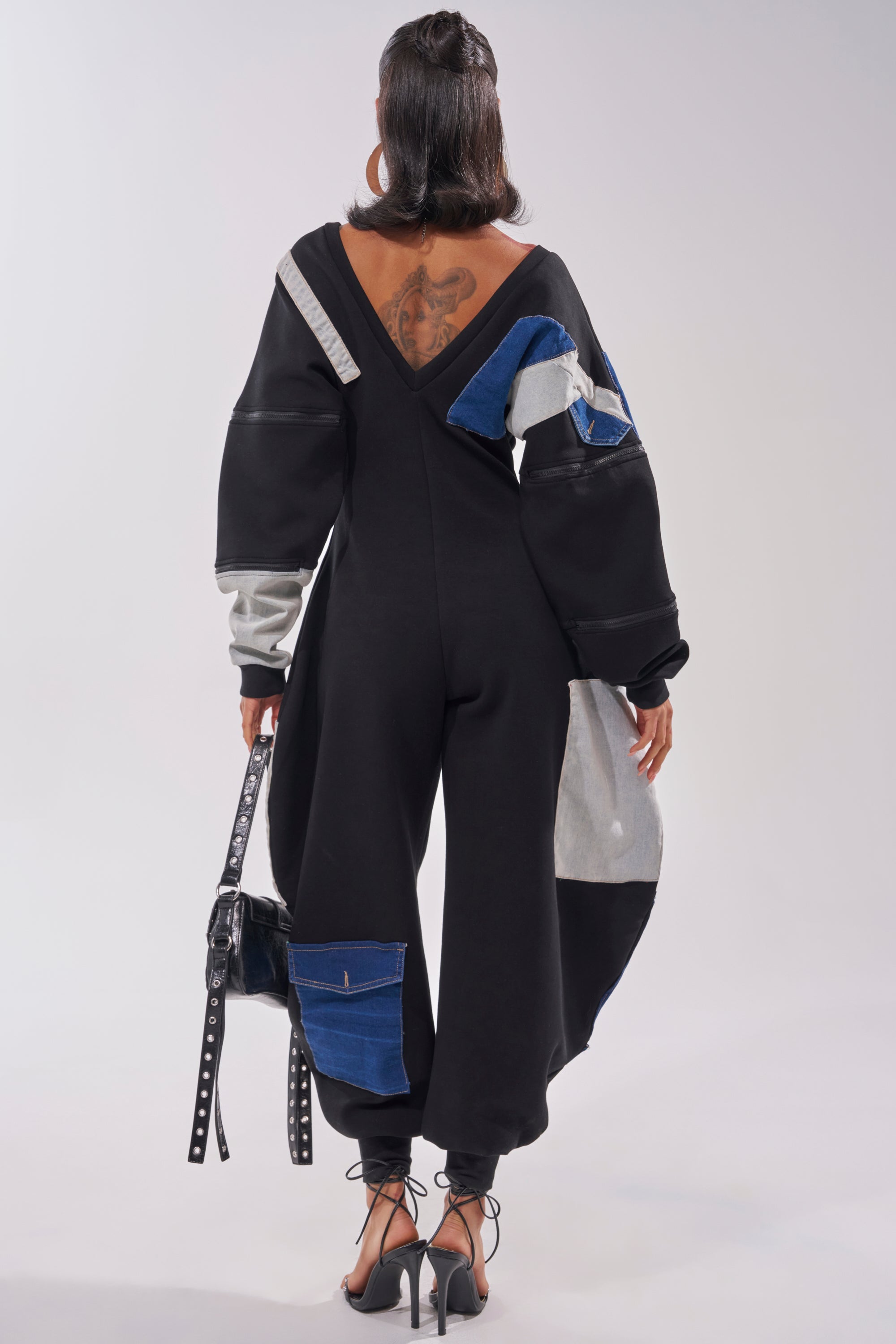 COMFY COZY SWEATSHIRT JUMPSUIT IN PATCHWORK DENIM IN BLACK