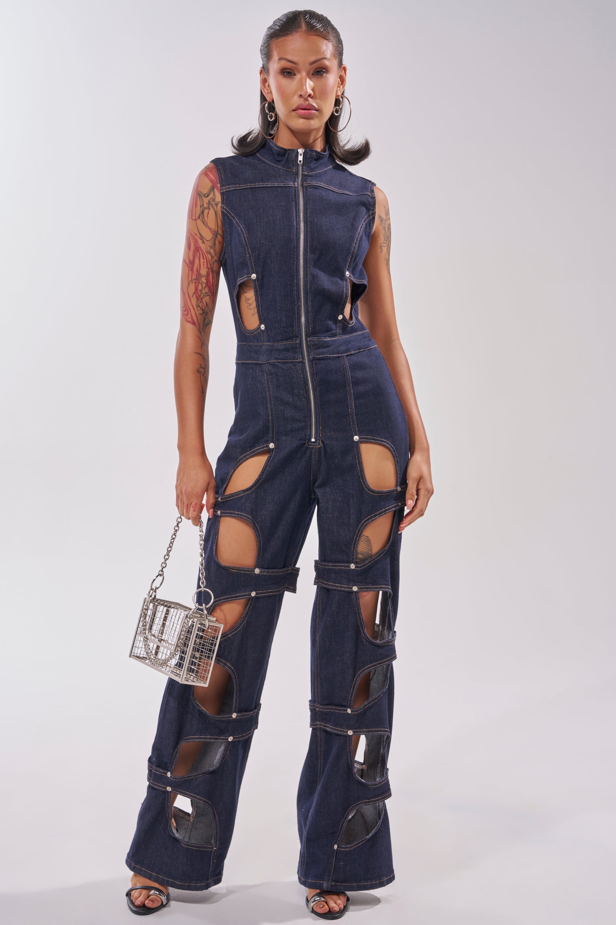 BRING THE ENERGY CUT OUT DENIM JUMPSUIT