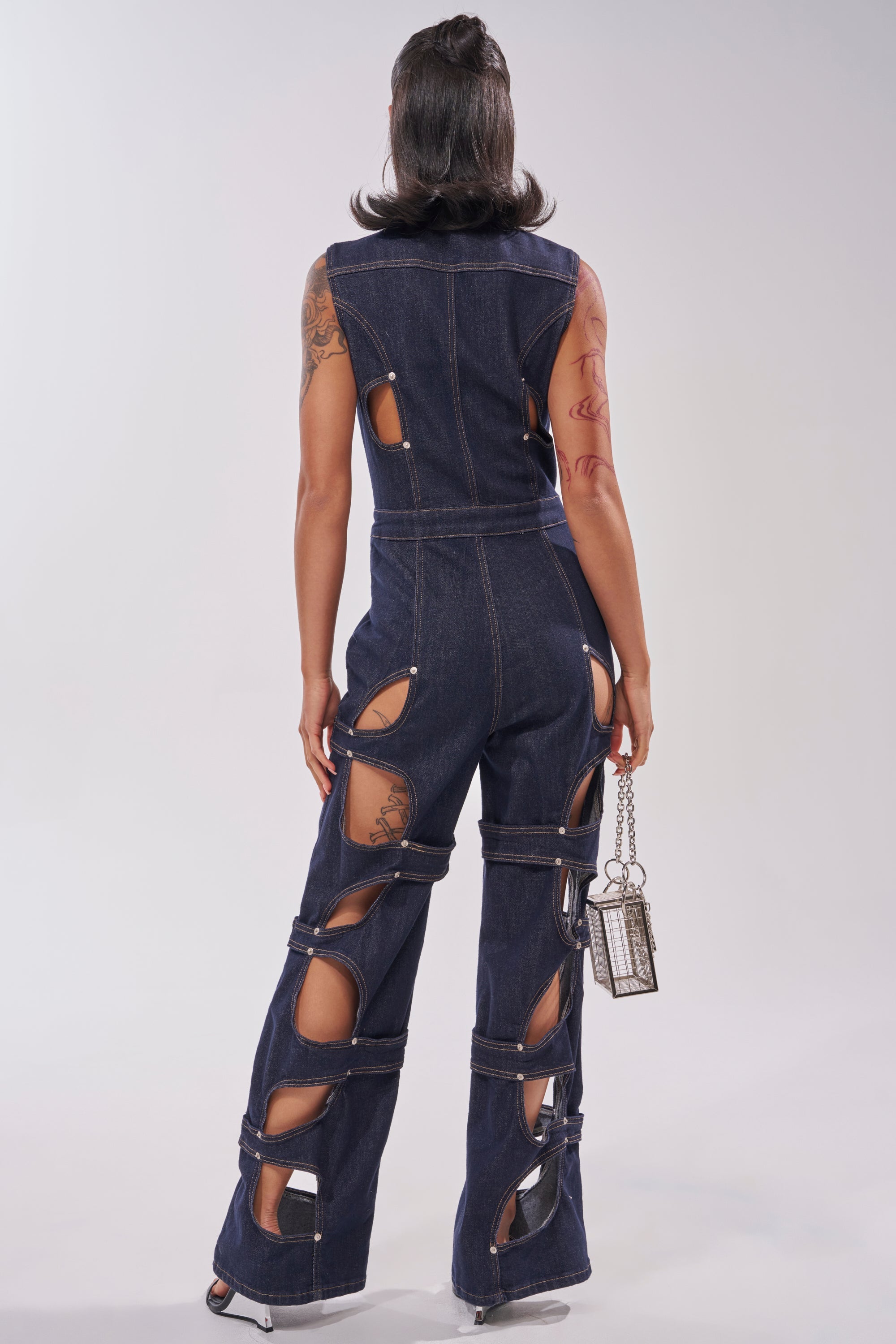 BRING THE ENERGY CUT OUT DENIM JUMPSUIT