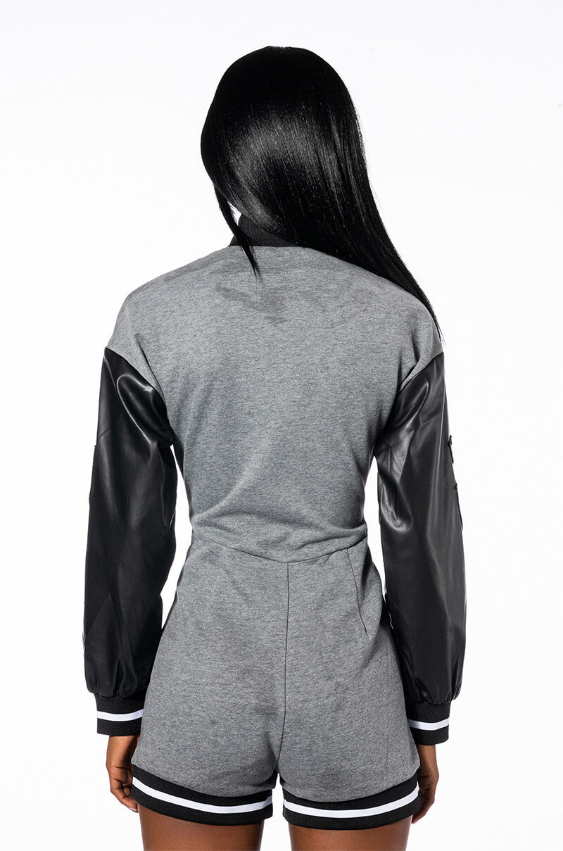 COLLEGIATE TEAM CAPTAIN LONG SLEEVE ZIPPERED MOCK NECK ROMPER
