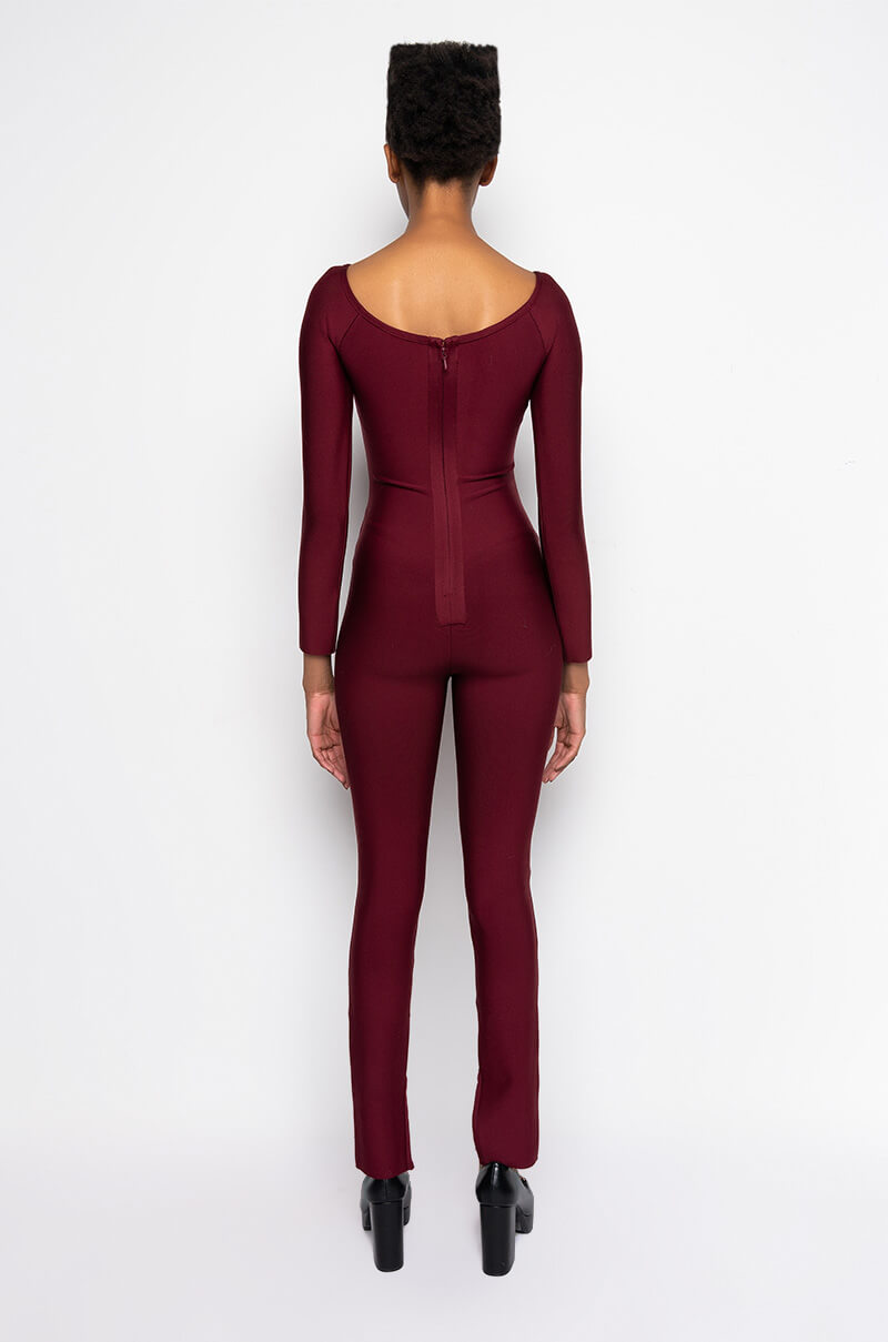 DOES WHAT SHE WANTS BANDAGE JUMPSUIT