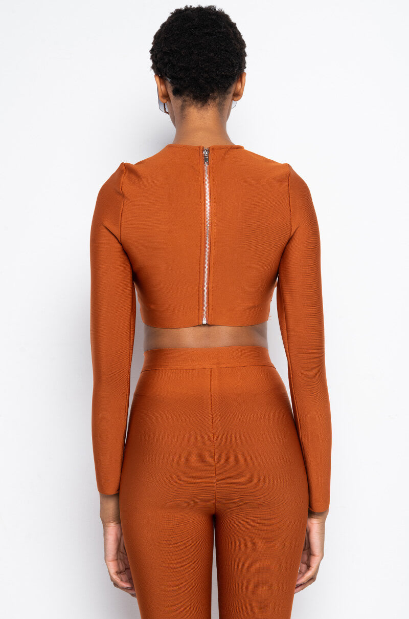 DRINKS ON YOU CUTOUT LONG SLEEVE BANDAGE TOP